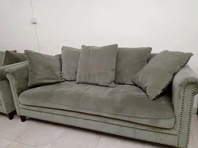 3-seater sofa in olive green with cushions