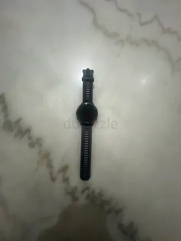 Used round-screen smartwatch with silicone strap - good working condition