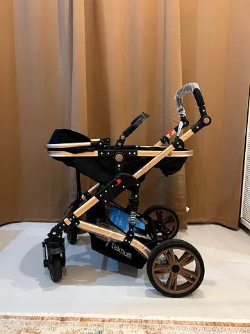 Lightweight Gold-Frame Baby Stroller / Pram in Good Condition