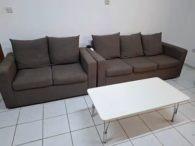 Two-seater and three-seater brown fabric sofas - good condition+ Two sofa chair