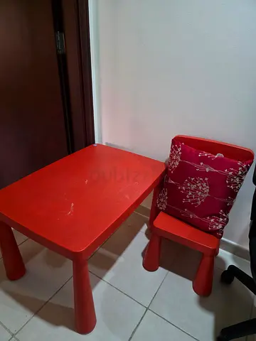 Red plastic kids table and chair set - sturdy and lightweight