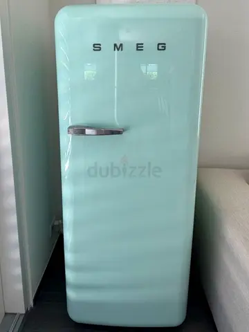 Smeg 50s Style FAB28 series single-door refrigerator in pastel green