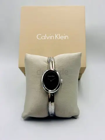 Calvin Klein womens bangle watch - black dial, silver bracelet
