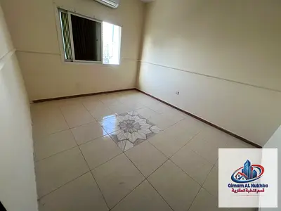 For annual rent: One-bedroom apartment in a prime location in Al Qulaya, near Sharjah Corniche. Open view, ventilation, natural light, central air con
