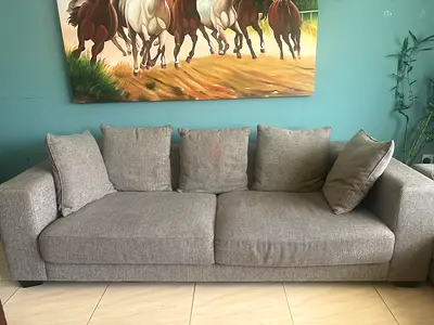The One - Light grey 2 x 3-seater fabric sofa in good condition. Original price AED 7000 plus