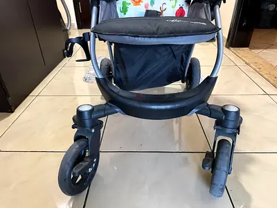 Lightly used baby stroller - Great condition, front wheel view