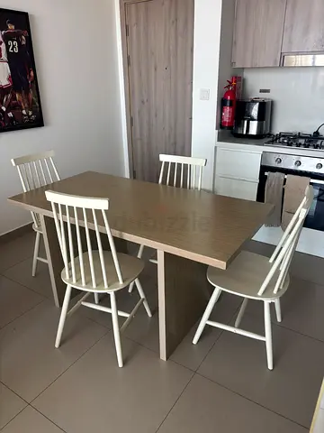 Wooden Dining Table with 4 Spindle Back Chairs - Light Oak Finish. Solid wood very sturdy.