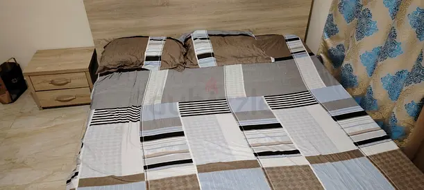 Queen size bed frame with mattress and two bedside tables - slightly defective