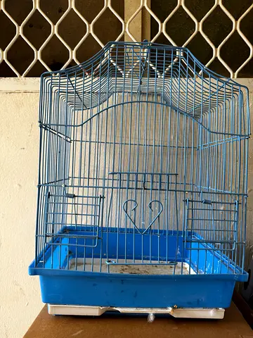 Blue metal bird cage with plastic tray - good condition