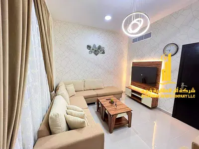 ✨The most luxurious furnished two-bedroom apartment for monthly rent in Ajman, Corniche area ✅ Includes bills and internet - Luxurious furnishings!