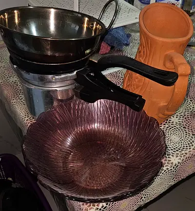 Assorted Kitchenware Collection with Pressure Cooker and Decorative Jug