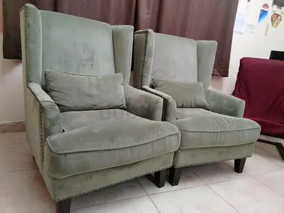 Pair of light green wingback lounge chairs - comfortable set