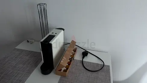 Nespresso Essenza Mini with capsule box and capsule holder