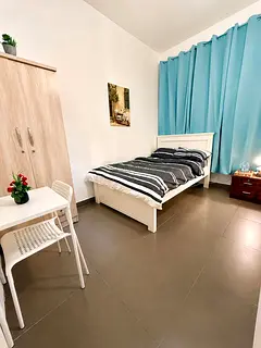 Daily Room Available in Khalidiya – Prime City Center