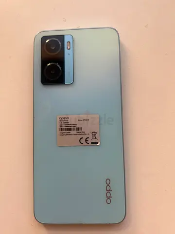 OPPO smartphone - mint blue, good condition (rear shown)
