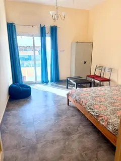 Bright  Spacious Room with big Balcony  Separate Washroom| Prime Karama Location- Fully Furnished