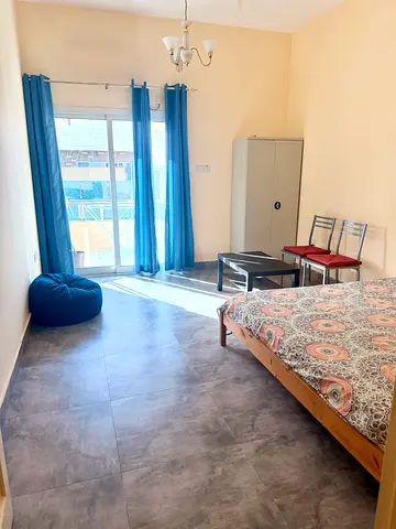 Bright  Spacious Room with big Balcony  Separate Washroom| Prime Karama Location- Fully Furnished