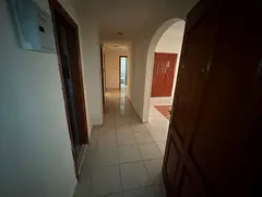 Two bedrooms and a living room for annual rent in Al Qasimia area, Sharjah | 2 bathrooms | Free air 