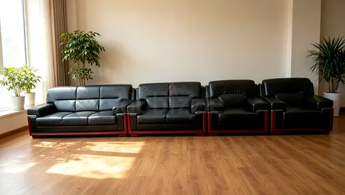 Black Leather 4-Piece Sofa Set with Wooden Base — Good Condition