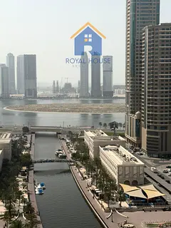 Panoramic Sea View in Al Qasba | Luxury 3BR with AC Covered by Owner