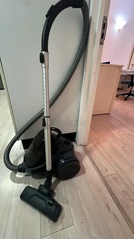 Compact canister vacuum cleaner - good working condition