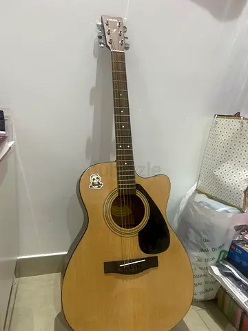 Acoustic cutaway guitar in good used condition