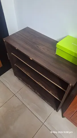 Small wooden shoe rack / low shelving unit - used