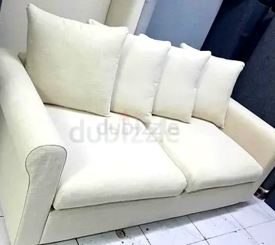 Cream 2-Seater Sofa cum bed with Cushions — Good Condition