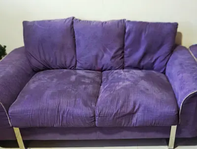 Price slashed..Used Purple 2-Seater 2 seperate Sofa in Good Condition