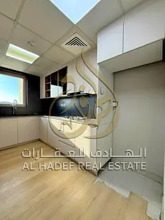 2BR apartment in Al Zahia with large balcony &amp; equipped kitchen, wardrobes, wooden flooring, poo