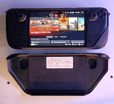 Steam Deck 1TB (handheld) with official dock/joy-con grip — good working condition