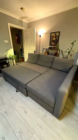 Grey fabric 3-seater sofa bed with chaise - good condition
