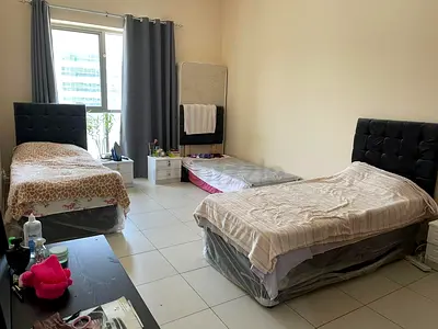 Beautiful bed space with two ladies in master room in front of mall of emirates For ladies only
