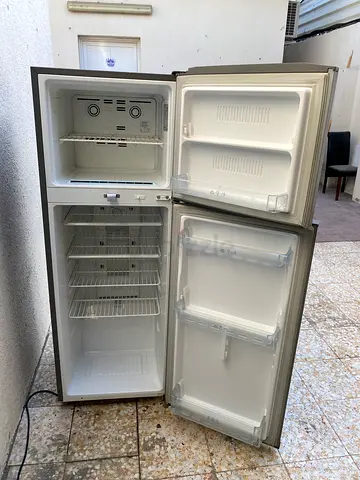 Used double-door refrigerator with freezer - working condition
