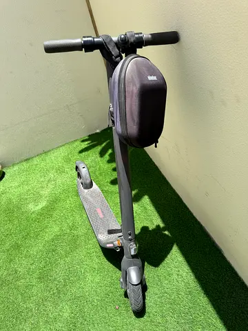 Well-kept Ninebot Segway E22E electric scooter with handlebar bag