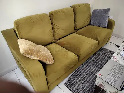 Olive green 3-seater sofa in good condition