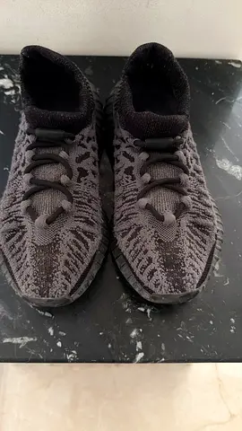 Yeezy Black knit slip-on sneakers, used