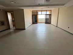 Two rooms and a living room in Al Nakheel, first occupancy, next to the gold market and bus station.