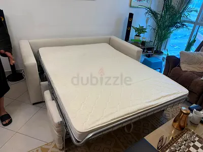 Sofabed natuzzai Italian comodo three seater sofa bed beige