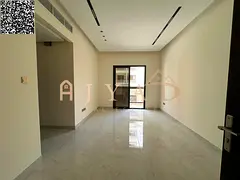 Brand-new 2BR hall apartment in Al Jurf 3, Ajman. Free month, central AC, balcony, 2 baths, panorami