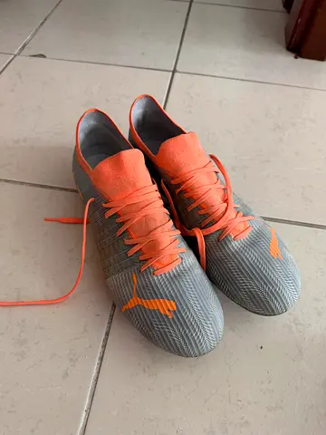 Puma football boots with studs, UK 11 size