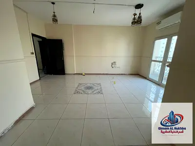 Luxury 1BHK, Al Qulaiah, Sharjah. Balcony, split AC, central gas. Prime location. AED 27,999 with f