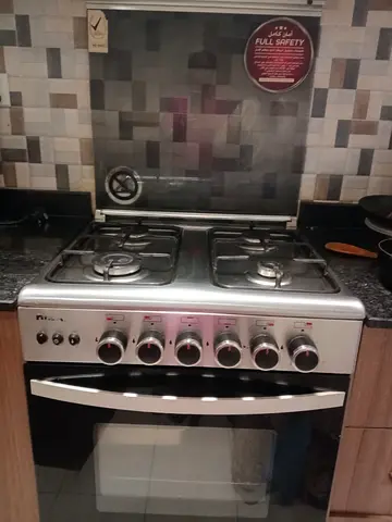 4-Burner Gas Cooker with Oven - Good Working Condition