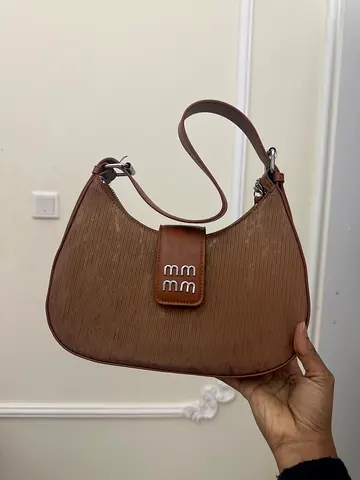 Brown small shoulder handbag with textured finish