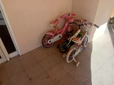 Set of 3 Kids Bicycles with Training Wheels - Good Condition