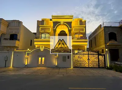 فرصة مميزة لامتلاك فيلا فاخرة بتصميم كلاسيكي راقٍ في منطقة الحليو 2 بعجمان، مقابل حديقة الحميدية مباشرة، وفي موقع مميز قريب من جميع الخدمات والمرافق ا