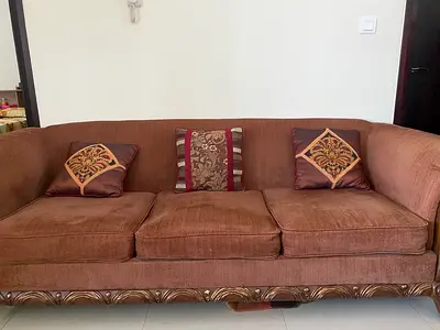 3-Seater Brown Fabric Sofa with Carved Wooden Base (Negotiable)