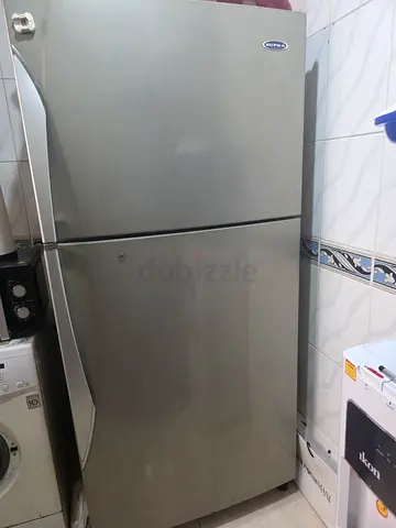 Silver double-door refrigerator, good working condition