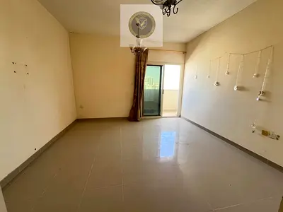 One bedroom and hall for annual rent in Bu Tina Sharjah spacious layout 2 balconies open view super deluxe finishing prime location close to Ajman and