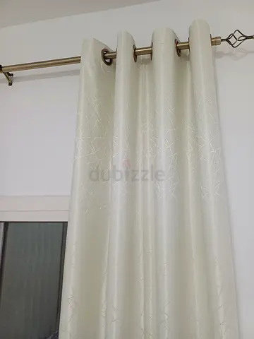 Pair of cream blackout eyelet curtains with curtain rod - 240 x 270 cm